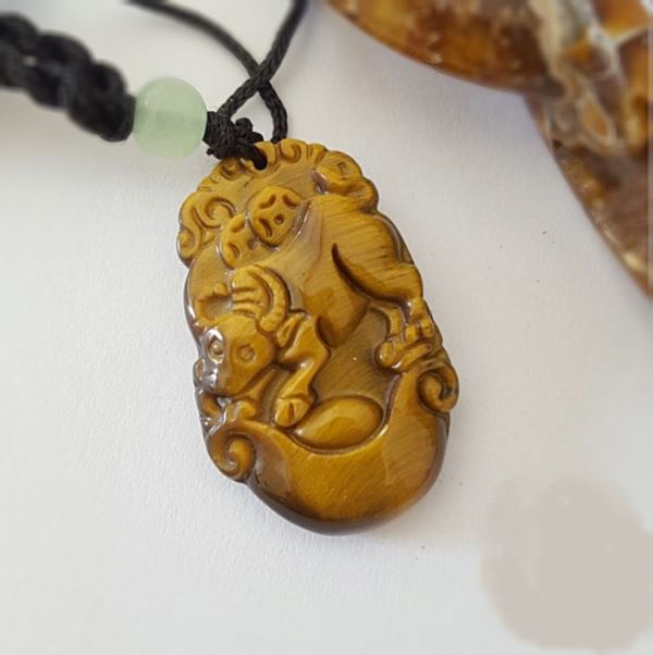 Mặt dây chuyền tuổi sửu mắt hổ M 999-2