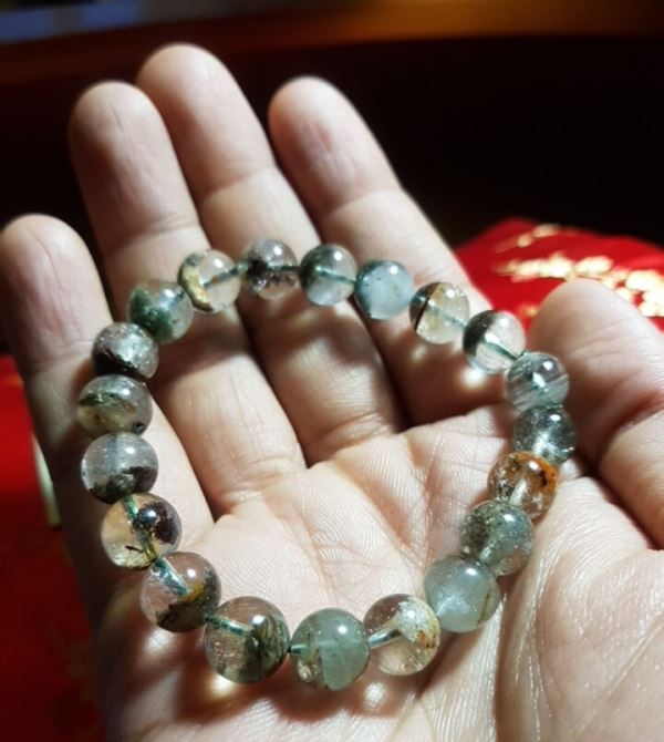 Mòng đeo tay đá ô liu M11